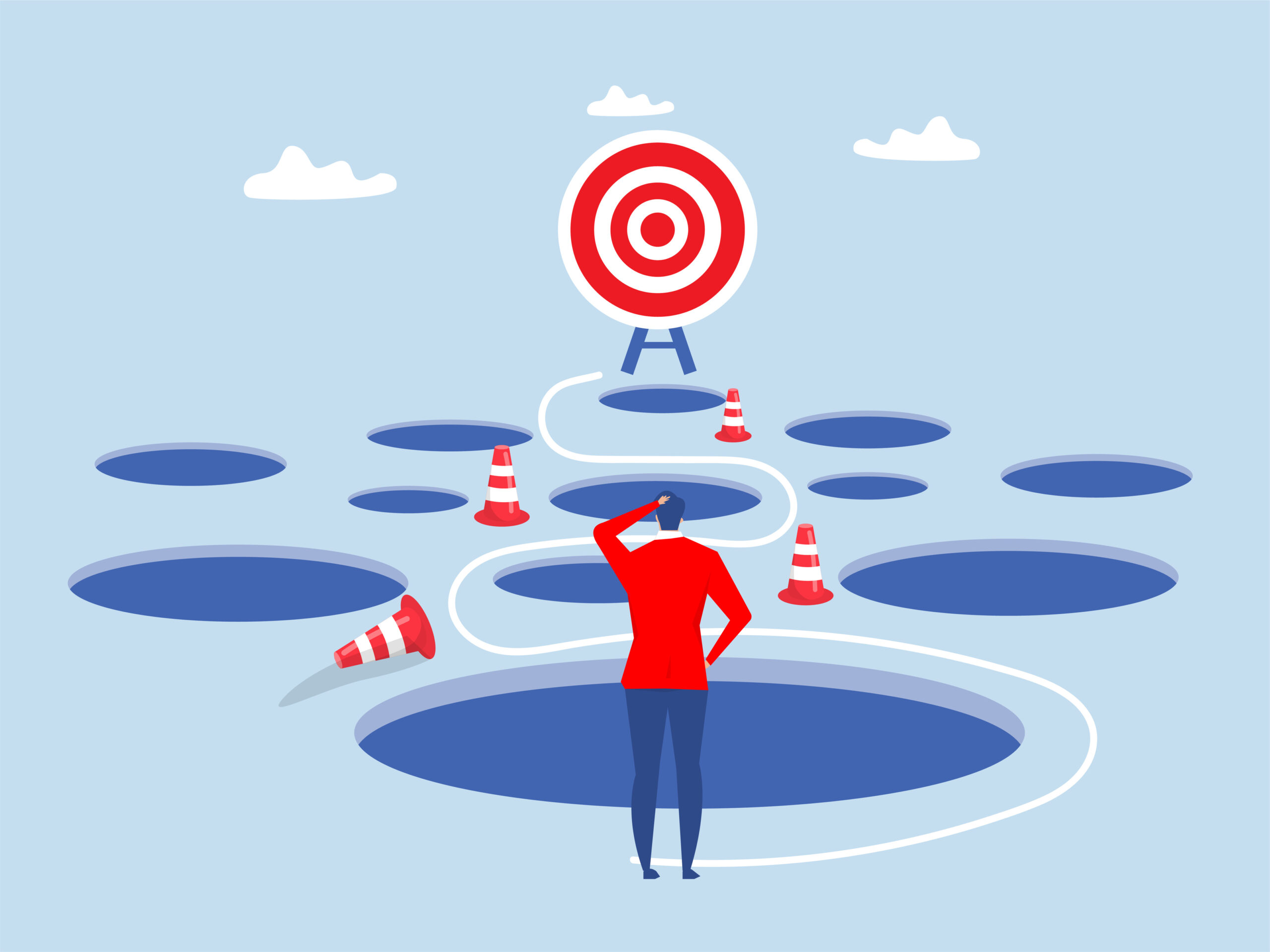 落とし穴を避けてゴールへ向かう道を確認する男性